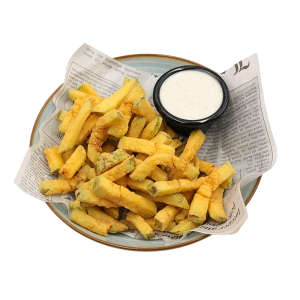 Тиквички по гръцки с млечен сос 